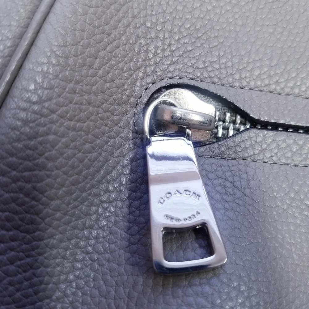 Coach excellent refer